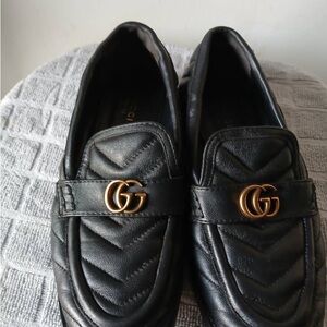 Gucci Black Quilted Flats with Gold Emblem